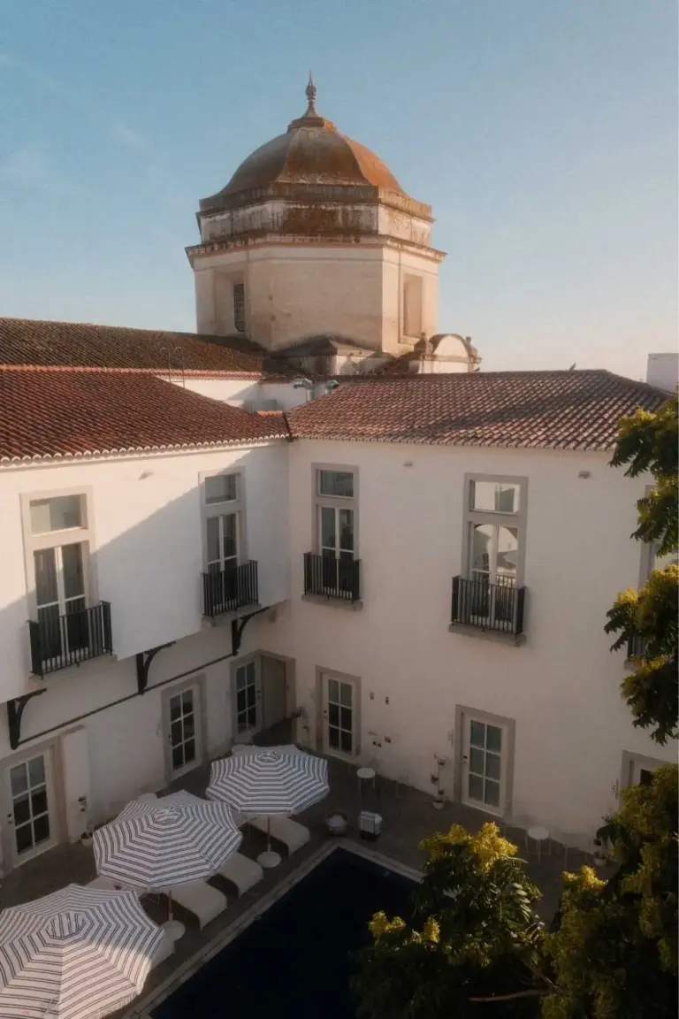Hotel with dome and courtyard in evening light