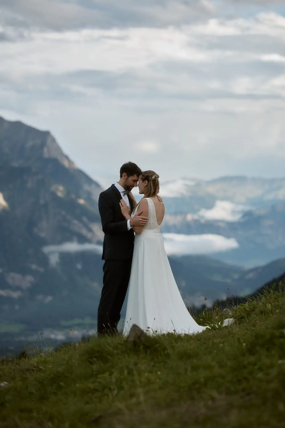 Wedding in the mountains: a bride and groom in Malbun, Liechtenstein.