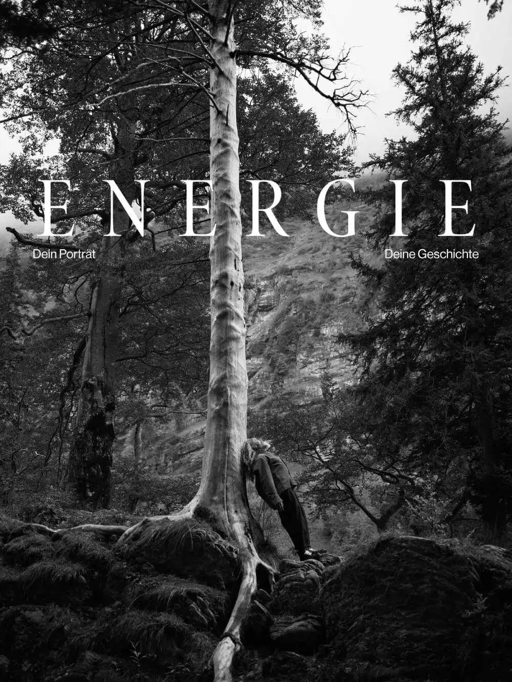 Black-and-white portrait in the forest with the word «Energie» – personal branding, photographer St.Gallen